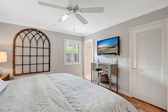 bedroom featuring ceiling fan, ornamental molding, and light tile patterned floors