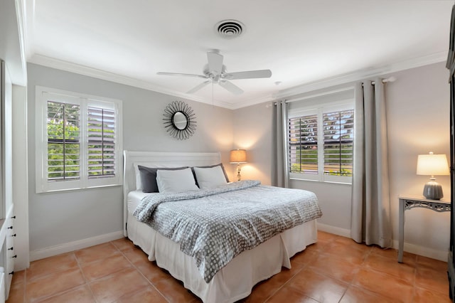 tiled bedroom featuring ceiling fan and crown molding