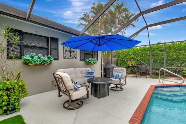 view of patio with an outdoor living space and a lanai