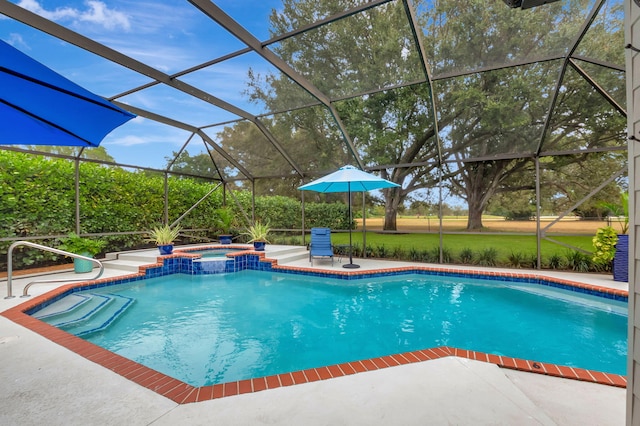 view of swimming pool featuring an in ground hot tub, a patio, and a lanai