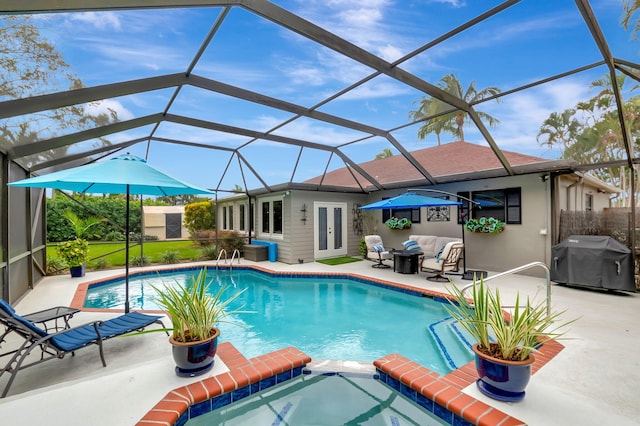 view of swimming pool featuring french doors, a patio, grilling area, and a lanai