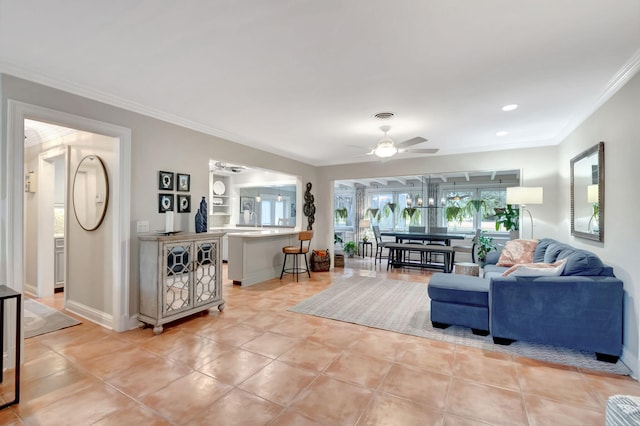 living room featuring ceiling fan, light tile patterned floors, and ornamental molding