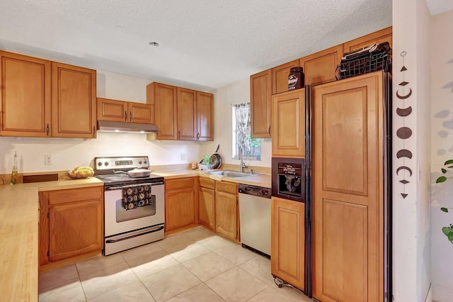 kitchen with electric range oven, stainless steel dishwasher, a textured ceiling, sink, and light tile patterned floors