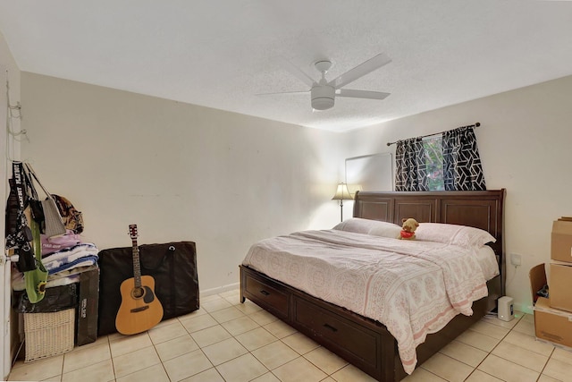 bedroom featuring ceiling fan and light tile patterned flooring