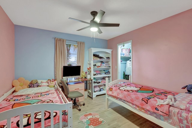 bedroom featuring ceiling fan and light hardwood / wood-style floors