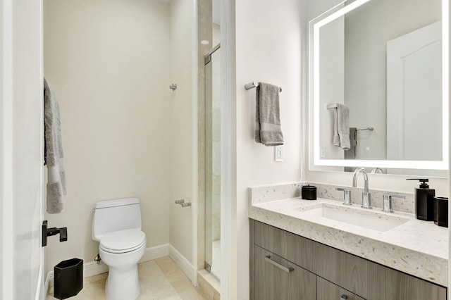 bathroom with toilet, vanity, tile patterned floors, and an enclosed shower