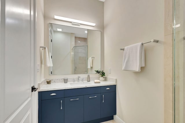 bathroom with vanity and walk in shower