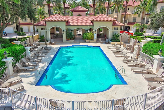 view of pool featuring a patio