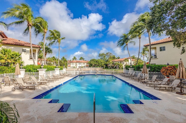 view of swimming pool with a patio