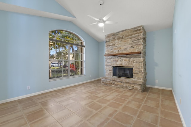 unfurnished living room with lofted ceiling, light tile patterned floors, ceiling fan, and a stone fireplace