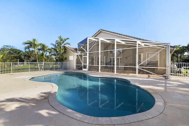 view of pool featuring a patio area and a lanai