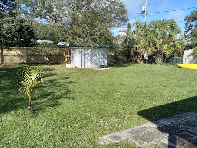 view of yard with a shed