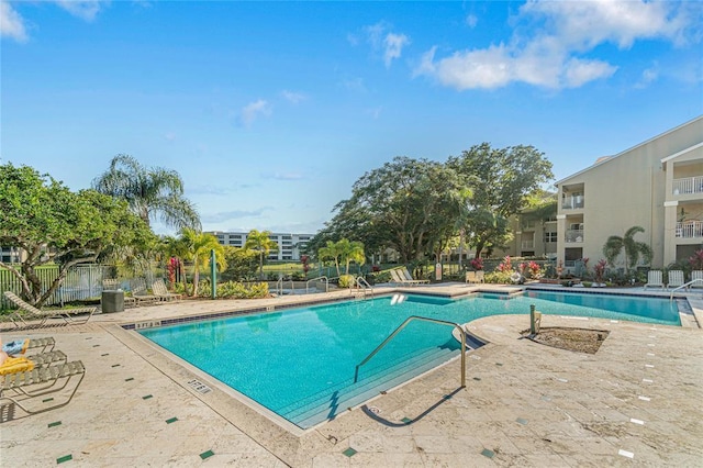 view of pool featuring a patio