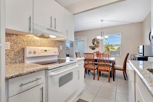 kitchen featuring white range with electric cooktop, an inviting chandelier, white cabinetry, and tasteful backsplash