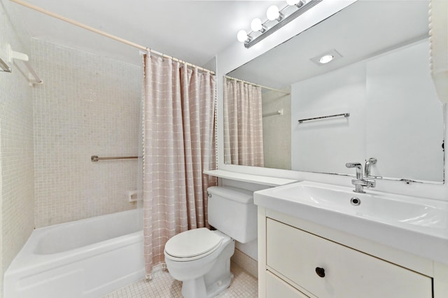 full bathroom with tile patterned floors, vanity, toilet, and shower / tub combo with curtain