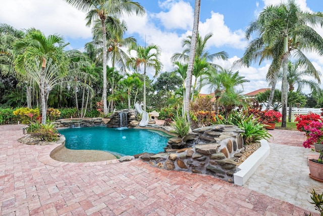 view of pool featuring a patio area