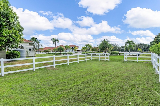 view of yard with a rural view