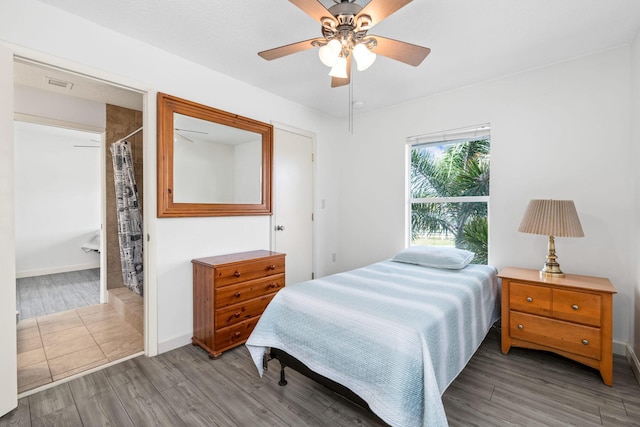 bedroom featuring ceiling fan and hardwood / wood-style floors