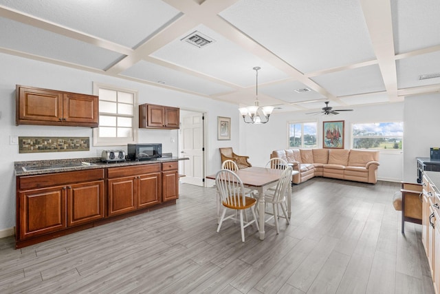 kitchen with light wood-type flooring, coffered ceiling, ceiling fan with notable chandelier, pendant lighting, and beam ceiling