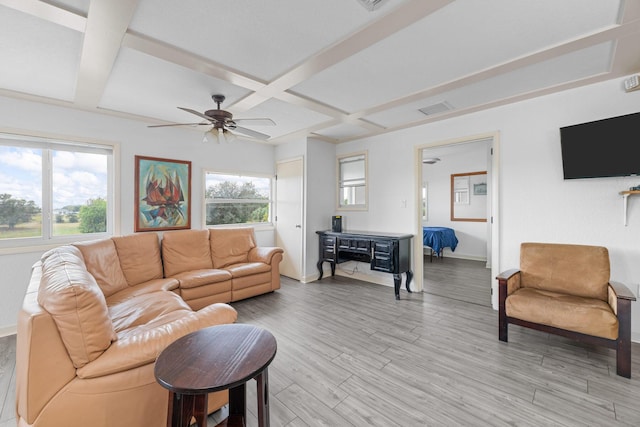 living room with beamed ceiling, ceiling fan, light hardwood / wood-style floors, and coffered ceiling