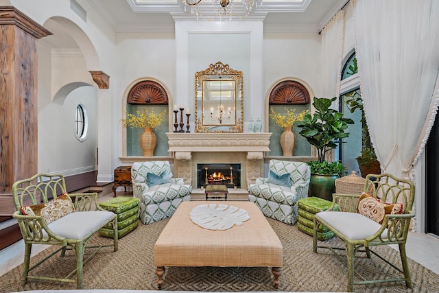 living area featuring ornamental molding and a towering ceiling