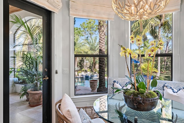 dining space with an inviting chandelier and plenty of natural light