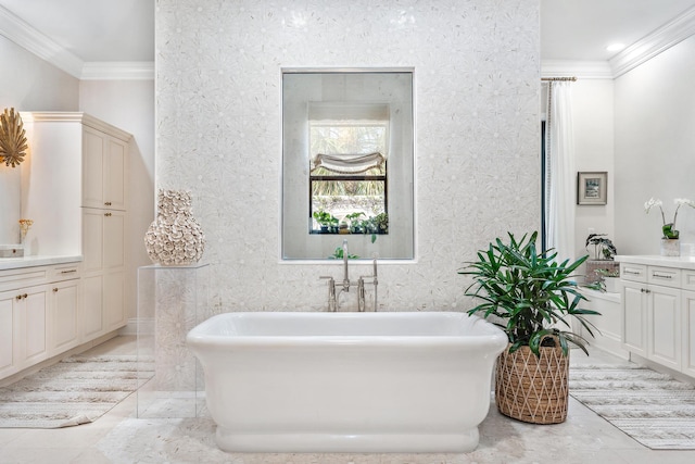 bathroom with crown molding, a bath, and vanity