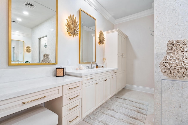 bathroom with vanity, crown molding, and tile patterned floors