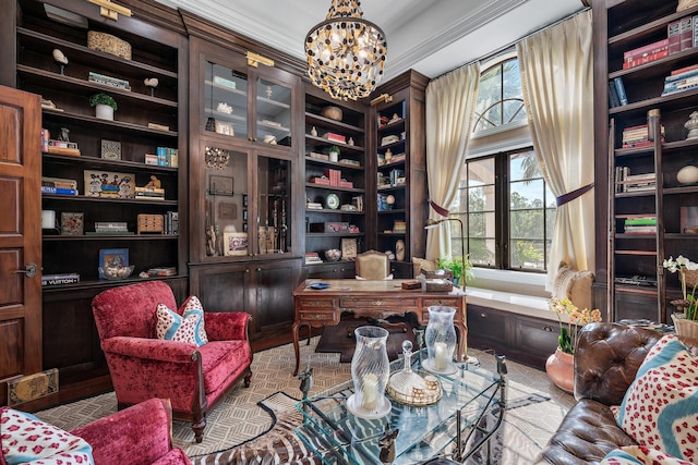 office space with crown molding and a chandelier