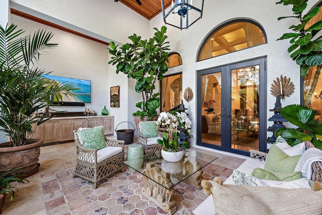 view of patio / terrace featuring french doors and an outdoor living space