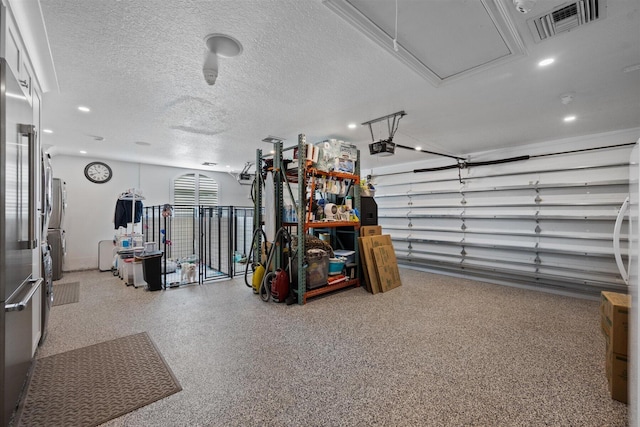 garage featuring high end fridge and a garage door opener