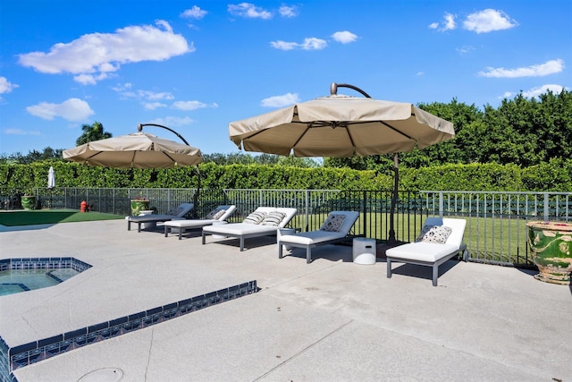 view of patio / terrace featuring a hot tub