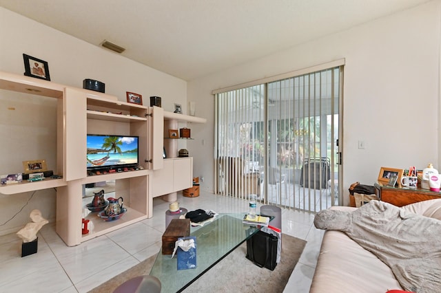 living room featuring light tile patterned floors