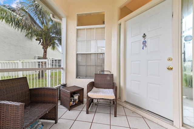 entrance to property with a porch