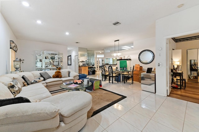 living room with light hardwood / wood-style flooring