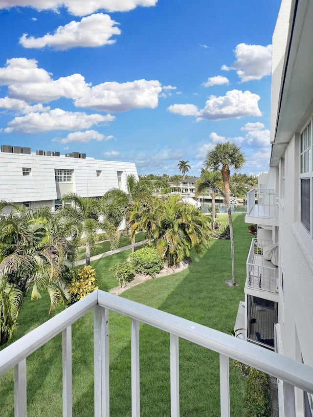 view of yard featuring a balcony