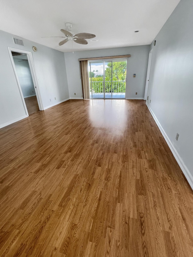 unfurnished room featuring wood-type flooring and ceiling fan