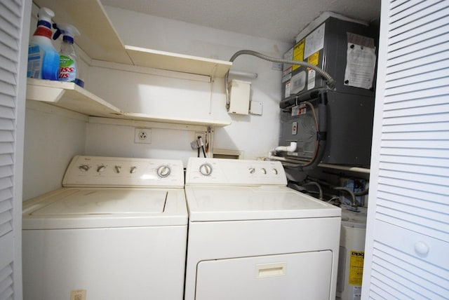 clothes washing area featuring washing machine and clothes dryer