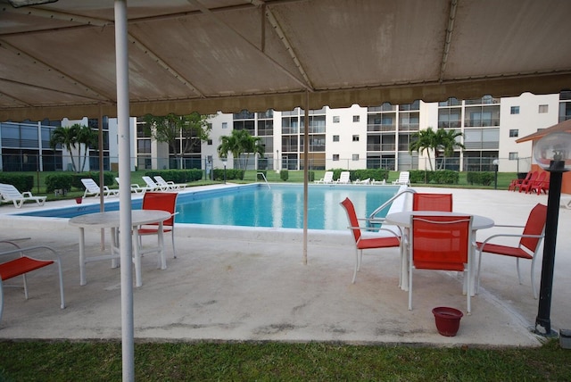 view of pool with a patio area