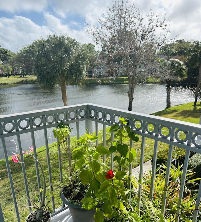 balcony featuring a water view