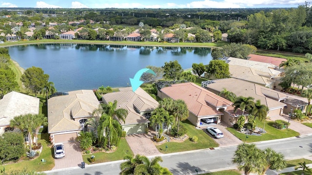 bird's eye view with a water view