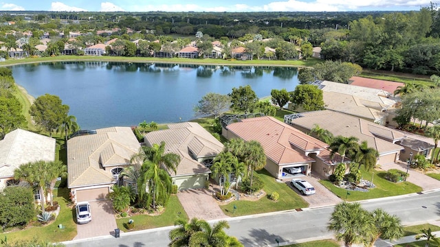 birds eye view of property featuring a water view