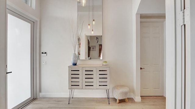 hall featuring light hardwood / wood-style flooring