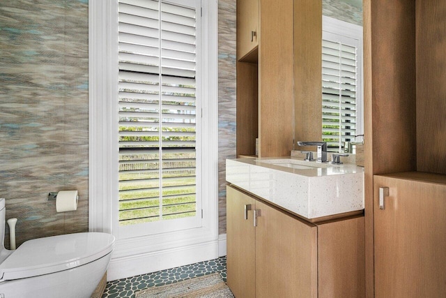 16071 Quiet Vista Cir, Delray Beach, FL 33446 - bathroom with tile patterned floors, toilet, plenty of natural light, and vanity