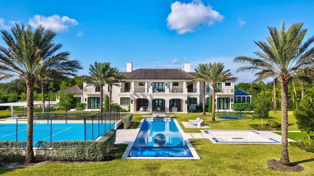 16071 Quiet Vista Cir, Delray Beach, FL 33446 - view of pool featuring a yard and fence
