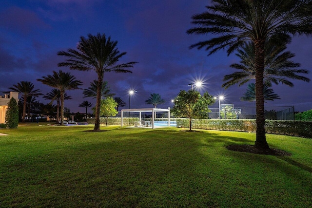 yard at twilight featuring a gazebo