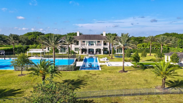 view of pool with a pergola and a lawn