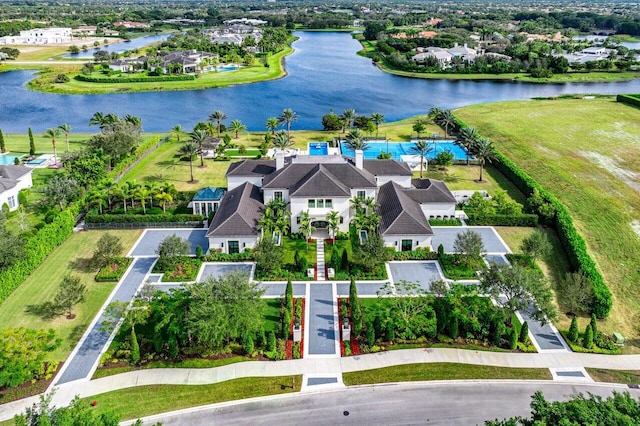 birds eye view of property featuring a water view