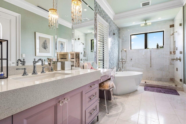 bathroom featuring vanity, ornamental molding, separate shower and tub, and an inviting chandelier