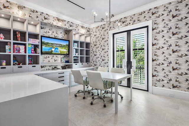 office area with french doors, ornamental molding, and an inviting chandelier